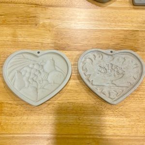 Vintage retired pampered chef stoneware baking cookie molds.